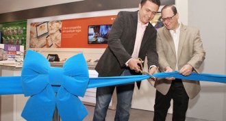 Snipping the ribbon to open a new Microsoft Authorized Reseller